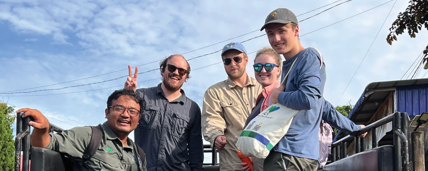 Group photo of UNH Changemakers in the back of a truck