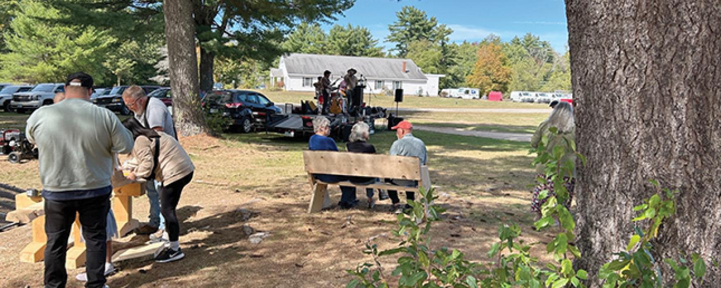 People gather at a town park