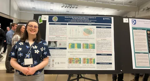 Erica Faucher presents her research poster at the Undergraduate Research Conference. 
