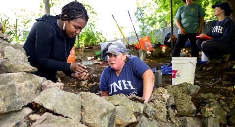 Kabria Baumgartner and Meghan Howey at a dig site