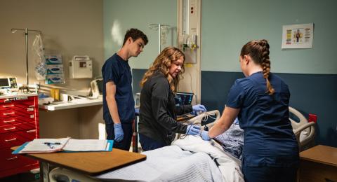 Students collaborate at the UNH Nursing Sim Lab.