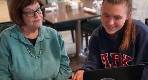 Riverwoods resident Sharyn Zunz interacts with a UNH student.                                             