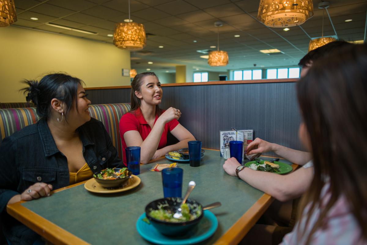 UNH students eating at Holloway Commons (HoCo) dining hall