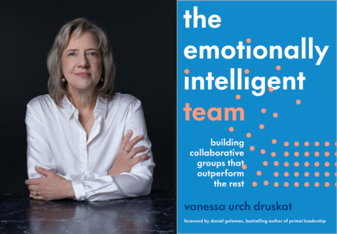 Image of a professor with the cover a book