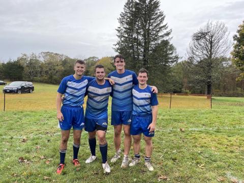 UNH Paul master's in finance student Peter Logee and friends