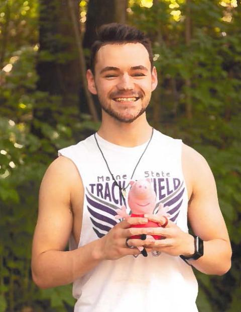 UNH student Wesley Coffin smiling at the camera