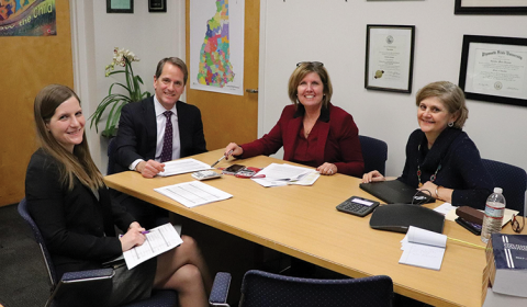 College of Health and Human Services staff in a conference room