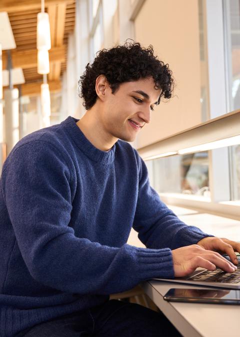 student on computer