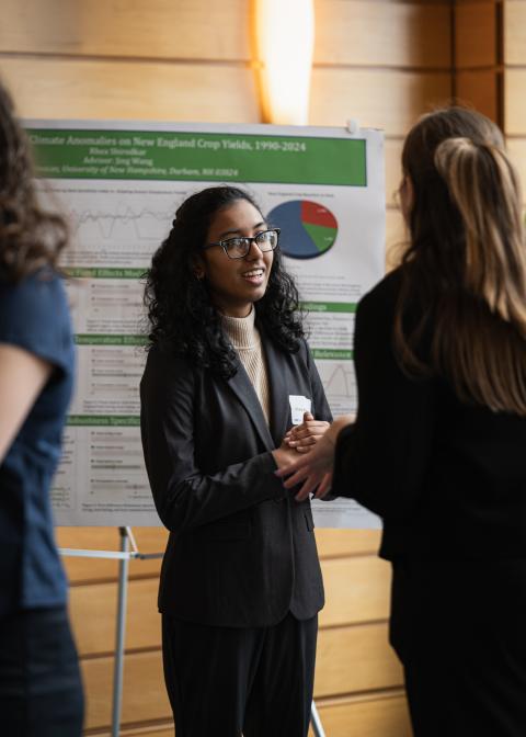 Rhea Shirodkar ‘26 presents her research poster.