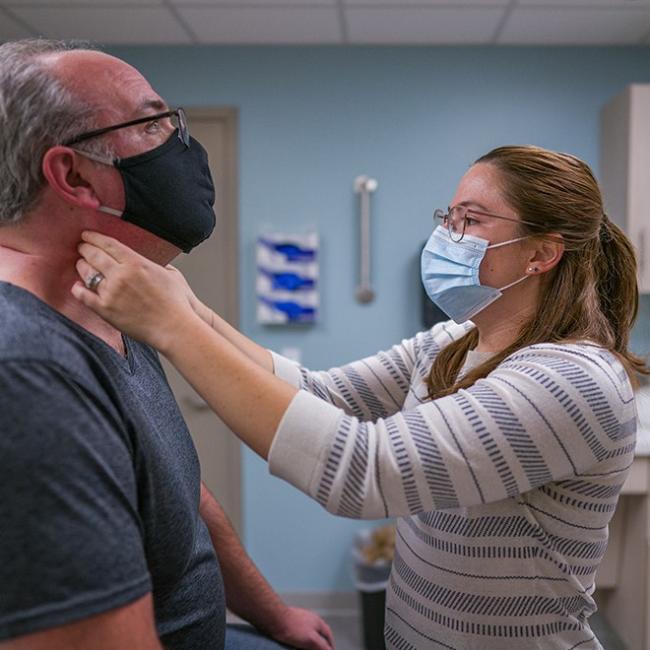 nurse checking a patient